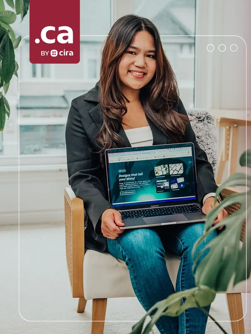 A smiling woman with a laptop on her knees in a bright living room, with the .CA by CIRA logo